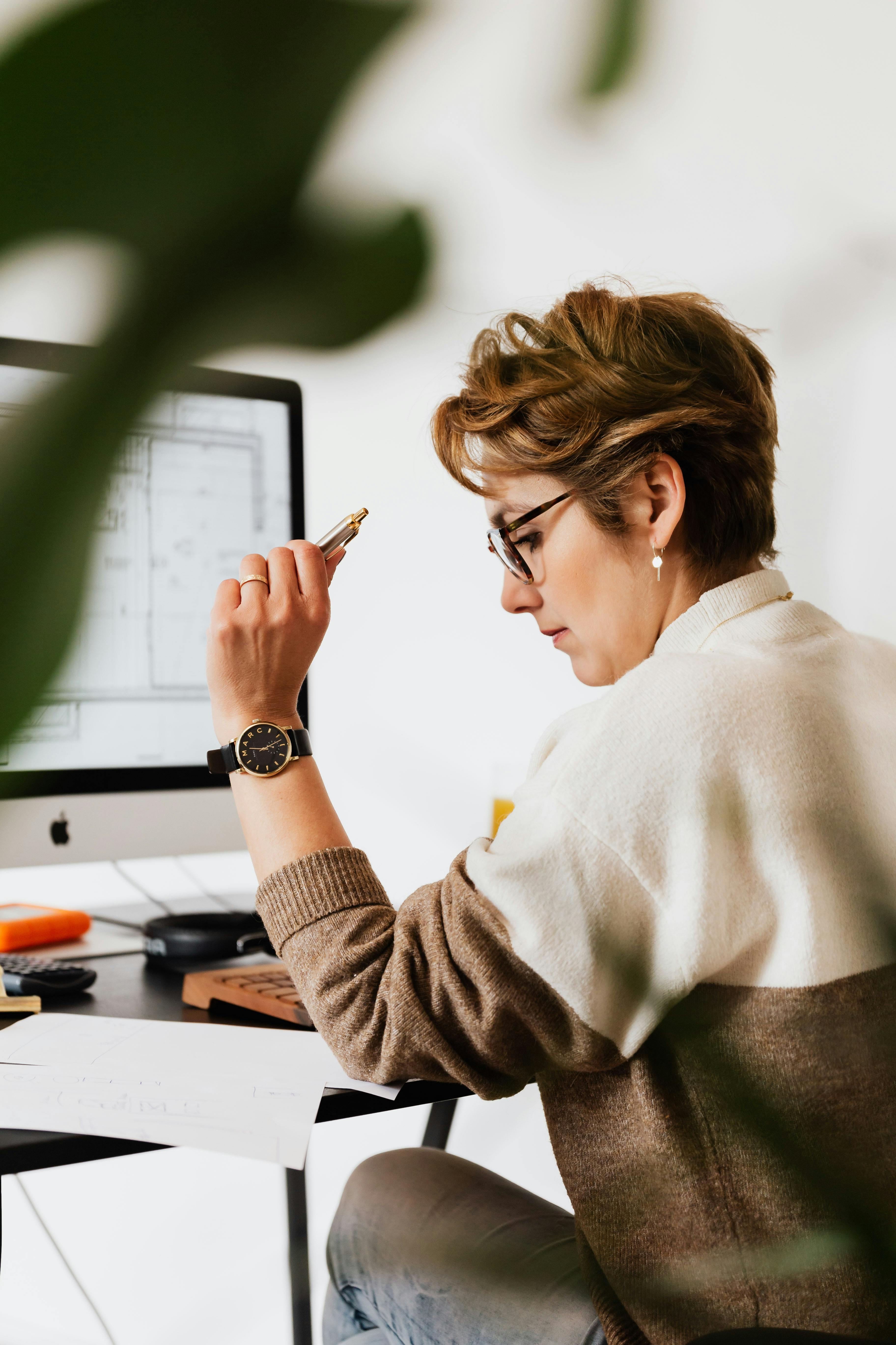Remote worker in deep concentration at their home office desk